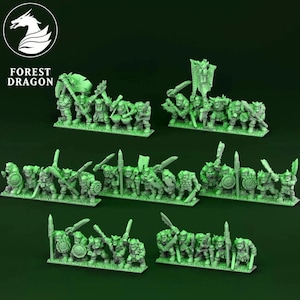 May include: A collection of green miniature fantasy figures, including orcs, with various weapons and shields. The figures are arranged in rows, with some holding banners. The Forest Dragon logo is in the upper left corner.