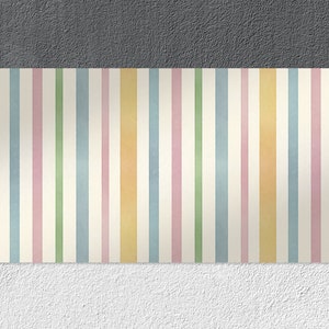 May include: A colorful striped pattern with alternating bands of yellow, pink, green, and blue. The stripes are on a white background.