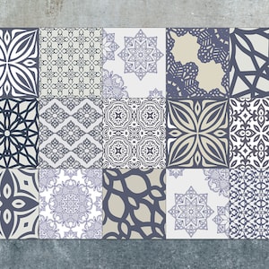 May include: A set of 12 decorative ceramic tiles with intricate geometric patterns in shades of blue, white, and beige. The tiles are arranged in a grid pattern, creating a visually appealing design.