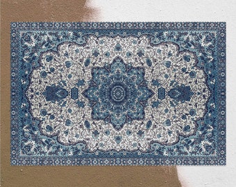 May include: A blue and white patterned rug with a floral design. The rug has a border with a repeating pattern of small squares.