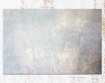 May include: A light gray textured background with a subtle white and light blue gradient. The background has a slightly distressed look with subtle speckles of color.