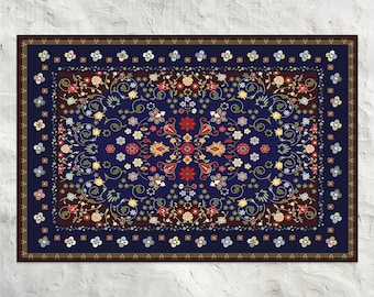 May include: A navy blue rug with a floral pattern in shades of red, yellow, green, and white. The rug has a border of small flowers in various colors.