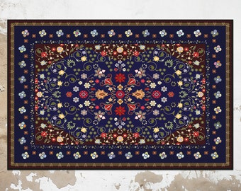 May include: A blue and red patterned rug with a floral design. The rug has a dark brown border and a light brown inner border.