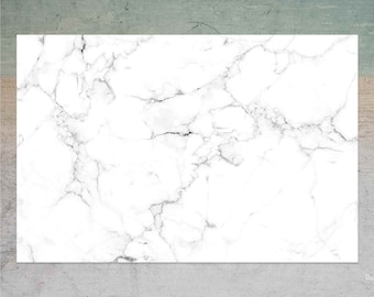 May include: White marble background with a smooth, polished surface and a subtle gray veining pattern.