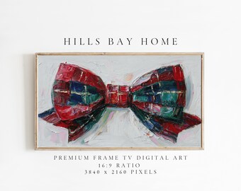 Puede incluir: Una impresión de arte digital enmarcada que presenta un gran lazo colorido. El lazo está pintado con un patrón de cuadros en tonos rojos, verdes y azules, con detalles dorados. La obra de arte está etiquetada como "HILLS BAY HOME" y está diseñada para una TV con marco premium.