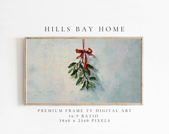 May include: Digital art print of a mistletoe sprig with green leaves and white berries, tied with a red ribbon, hanging against a textured, light blue background. The artwork is framed and includes the text "HILLS BAY HOME".