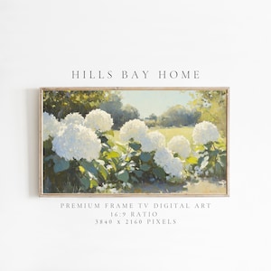 May include: A framed digital art print featuring a landscape with white hydrangea flowers in a field. The artwork is labeled "Hills Bay Home" and is designed for a premium frame TV with a 16:9 ratio and 3840 x 2160 pixels.