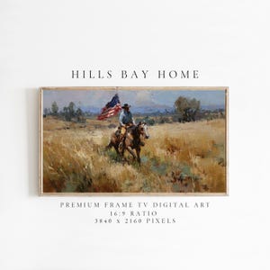 May include: A framed digital art print featuring a cowboy riding a horse through a field, holding an American flag. The artwork has a vintage, painterly style with warm, earthy tones. The text "HILLS BAY HOME" is at the top.