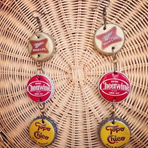 Holy Trinity Bottle cap statement earrings. Recycled and lightweight. Miller highlife-Cheerwine-Tope Chico. Can do custom orders.