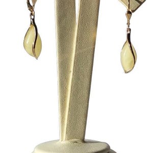 Gold earrings with Baltic amber