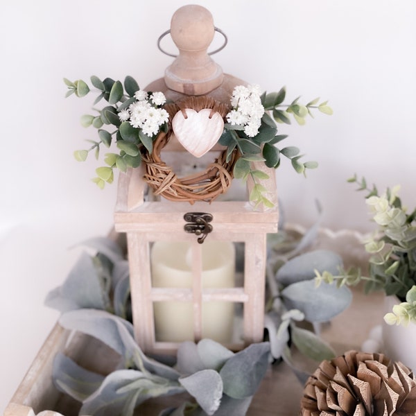 Baby's breath lantern swag centerpiece. Eucalyptus and white baby's breath swag. Farmhouse lantern swag. Country decor for lanterns.