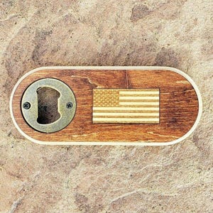Wooden American Flag Bottle Opener. Hand crafted and laser engraved. Magnet on back. 2.5&quot; x 5.5&quot; and 1/2&quot; thick.
