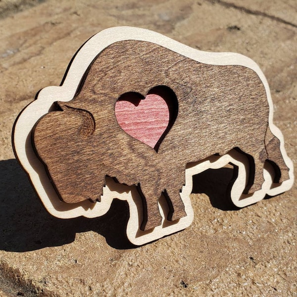 Engraved Wooden Buffalo Heart Magnets. Hand crafted and laser engraved. 4" Diameter and 1/4" thick.