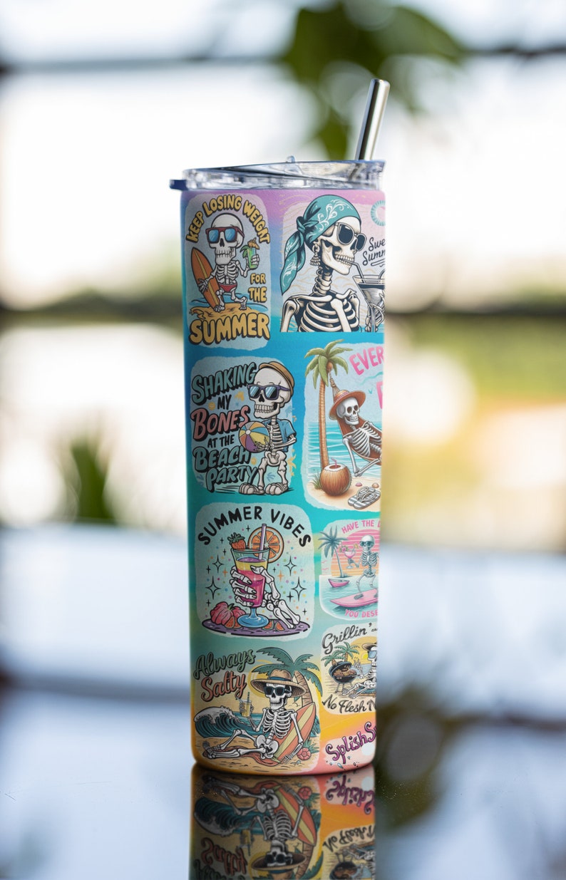 May include: A stainless steel tumbler with a colorful design featuring a skeleton in various summer-themed scenes. The tumbler has a straw and the text "Keep Losing Weight for the Summer", "Shaking My Bones at the Beach Party", "Summer Vibes", "Always Salty", "Have the Time of Your Life", "Grillin' No Flesh", and "Splish Splash" is visible on the tumbler.