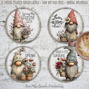 May include: Four round coasters with gnome illustrations and floral accents. Each coaster features a different gnome design with phrases like "living the Spring life" and "Spread a little sunshine".