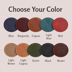 May include: A colour selection chart featuring ten circular leather swatches arranged in two rows. The text "Choose Your Colour" appears at the top. The colours labelled are blue, burgundy, cognac, light blue, red, light brown, light cognac, green, black, and brown.