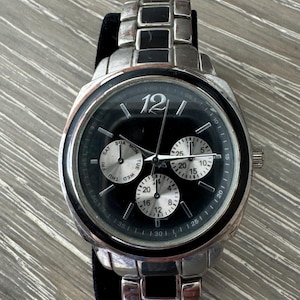 Reloj vintage de cuarzo de acero inoxidable y esmalte negro para hombre
