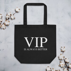 May include: Black tote bag with white text that reads "VIP is always better".