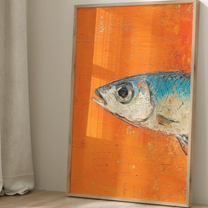 May include: A framed painting of a single fish with a blue and white body on an orange background.