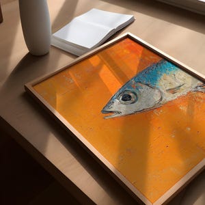 May include: A framed painting of a blue and silver fish on a bright orange background. The fish is facing the left side of the frame and has a detailed eye.