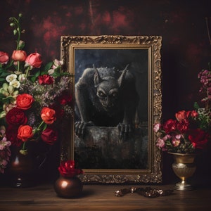 May include: A framed painting of a dark, menacing gargoyle with sharp teeth and claws, set against a dark background. The painting is surrounded by a gold frame with ornate details. The painting is displayed on a dark wooden surface with red roses and other flowers in vases on either side.