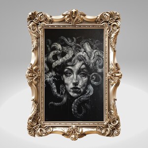 May include: A black and white painting of Medusa, a mythical Greek figure with snakes for hair, framed in a gold ornate frame.