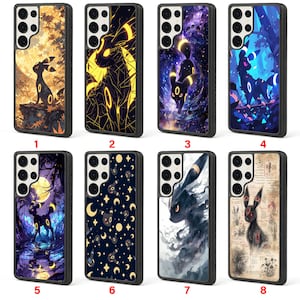 May include: A collection of eight phone cases featuring various designs. The cases showcase artwork of a black creature with yellow accents, set against backgrounds of moons, stars, and abstract patterns. Each case has a black border.