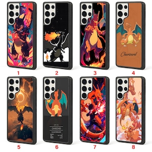 May include: A collection of eight phone cases with various designs featuring the Pokémon Charizard. The cases showcase different artistic styles, including vibrant illustrations and graphic designs. Each case has a black border and a camera cutout.