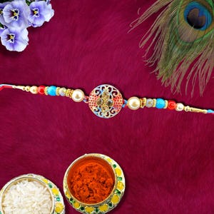 Handmade Floral Design Rakhi with Beads Beautiful Premium Raksha Bandhan Thread Rakhi for Brother Bhai Pendant Motif Rakhi