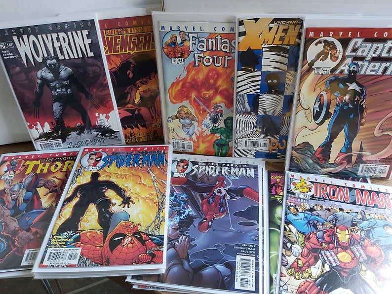 Vintage Comic 21st birthday gift set showing 3 comics with front covers featuring the superheroes. Comic gifts are all supplied with new clear display sleeves and white backing boards. From 2004 making them a great 21st birthday gift idea for men