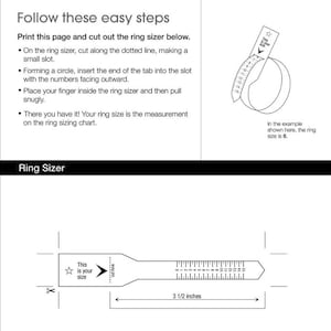 May include: A white ring sizer with instructions and a diagram. The text reads "RingsJewels" at the top. The sizer is 8.89 cm long and has a scale for measuring ring sizes. Instructions include cutting and inserting the tab.
