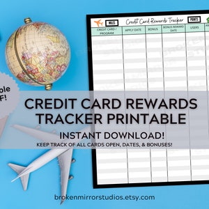 May include: A printable credit card rewards tracker with a black border and white interior. The tracker has columns for credit card program, apply date, bonus, bonus reward date, points users, and annual fee. The tracker is labelled "Credit Card Rewards Tracker Printable" and "Instant Download!" with the text "Keep track of all cards open, dates, & bonuses!" below. The tracker is surrounded by a blue background with a globe, a toy aeroplane, and a camera.