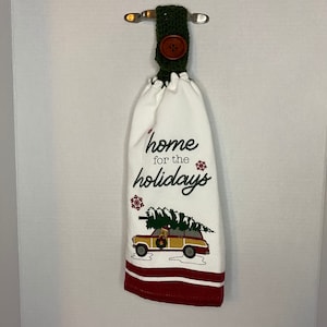 Happy Holidays hanging towel with red truck and black lab with matching Christmas crocheted topper