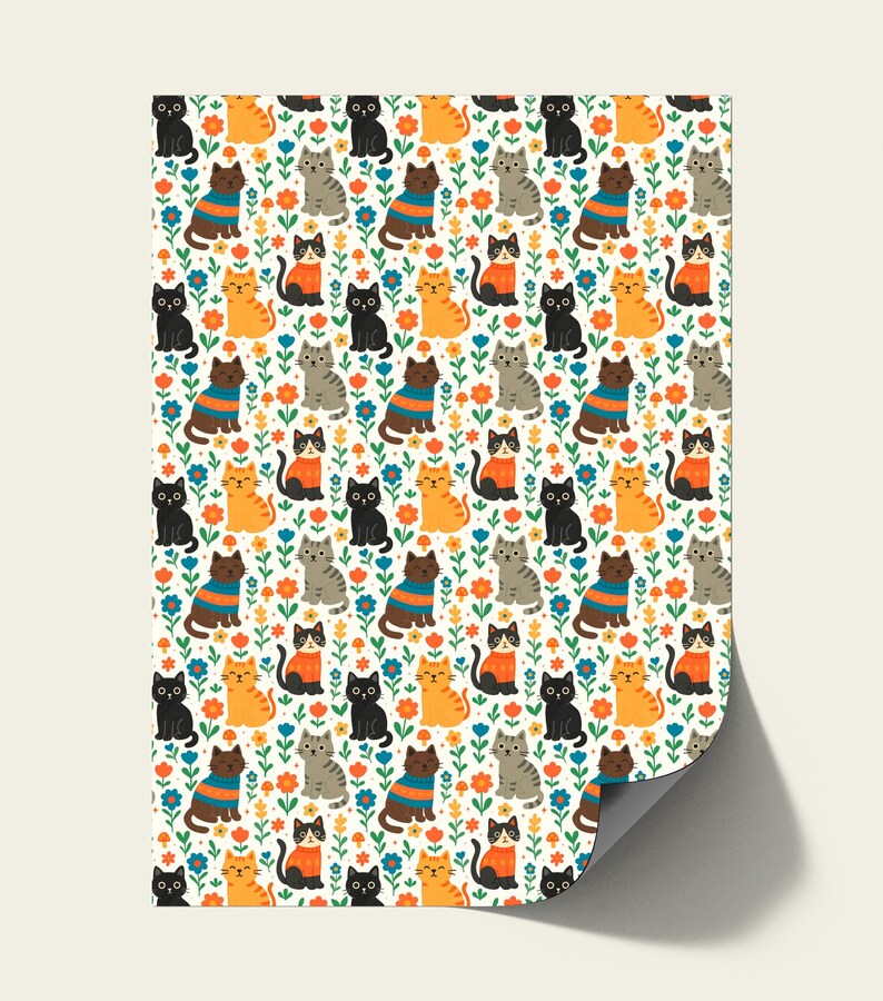 May include: A patterned fabric featuring a repeating design of cartoon cats in various colors, including black, orange, gray, and brown. The cats are interspersed with colorful flowers and green foliage on a white background. Some cats wear sweaters.
