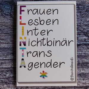 May include: White card with the acronym "FLINT" written vertically in black. Each letter is decorated with a different pride flag. The word "Frauen" is written next to the "F", "Lesben" next to the "L", "Inter" next to the "I", "Nichtbin&auml;r" next to the "N", "Trans" next to the "T", and "Gender" next to the "A". A rainbow asterisk is at the bottom of the card. The text "@Bascholdmaidli" is written in the bottom right corner.