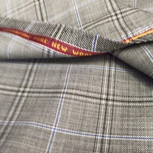 Black and White With Blue Overcheck Onyx Super 100&#39;s Luxury Jacketing And Suiting Fabric