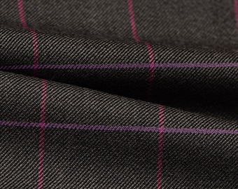 May include: Close-up of a dark gray fabric with a subtle woven texture. The fabric features a grid pattern of thin, intersecting lines in a vibrant magenta color. The fabric is draped, showing folds and shadows.