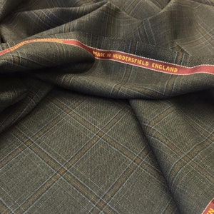 Dark Grey With Rust And Blue Check Onyx Super 100&#39;s Luxury Jacketing And Suiting Fabric