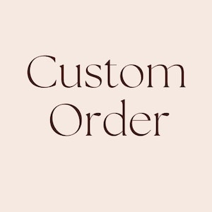 May include: Text that reads "Custom Order" in a brown serif font.