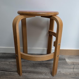 Vintage DANISH design wooden stool with red seating in the style of Alvar Aalto from the 80s