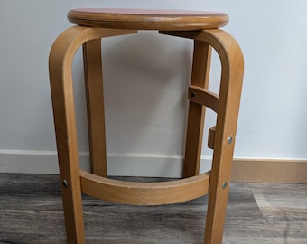Vintage DANISH design wooden stool with red seating in the style of Alvar Aalto from the 80s