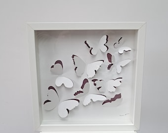 Diseño de mariposa 3D de IKEA OLUNDA, creado por Lola Fraser en los años 90 y actualmente descatalogado.