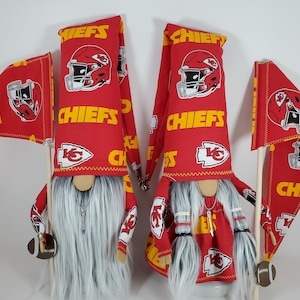KC Chiefs Gnomes, with matching pennant flag! Sports fans will love this awesome tailgate Gnome! Wears silver arrow charm ready for gifting!