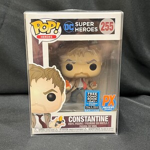 May include: A Funko Pop! vinyl figure of Constantine from DC Comics' Super Heroes series, number 255. The figure is in a clear display box with the text "FREE COMIC BOOK DAY" and "PX PREVIEWS EXCLUSIVE".