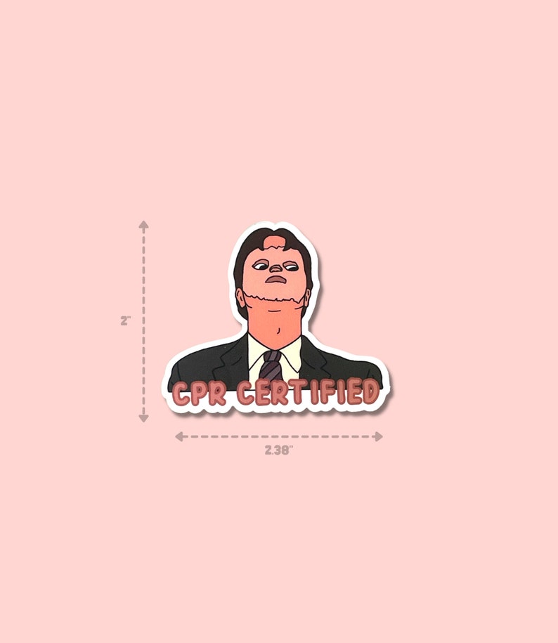 May include: A sticker featuring a cartoon illustration of a man in a suit with the text "CPR CERTIFIED". The sticker is approximately 2 inches tall and 2.38 inches wide, with a pink background.