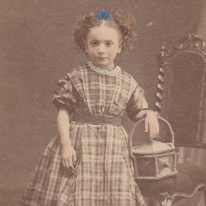 Antique Carte de Visite – Young Girl with Basket, Hand-Tinted Bow – Brighton, England
