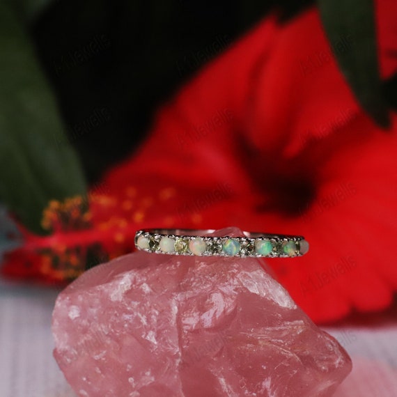 Sterling Silver Amethyst, Blue Topaz, Opal & Peridot Textured 4 Band Ring Set Sterling Silver Amethyst, Blue Topaz, Opal & Peridot Textured 4 Band Ring Set