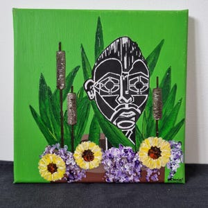 Sztuka doniczkowa z głową robota