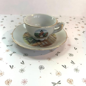 Spinning Tea Cup & Saucer Small Foreign Ceramic Vintage, Welsh Lady.