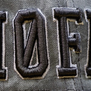 Detail image, Ham radio Call sign hat for the amateur radio or GMRS operator. Black Kryptek pattern custom text hat.